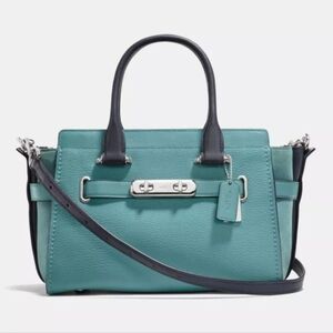 Coach Swagger 27 satchel in marine blue pebble leather.